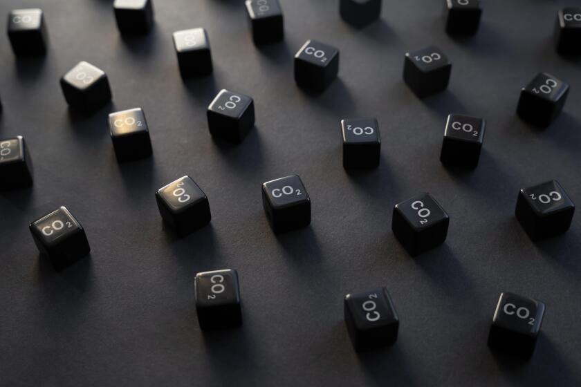 Blocks of carbon dioxide CO2. Ecology pollution. Visualization in cubic tons volumes of greenhouse gas emission. Impact on environment. Climate change