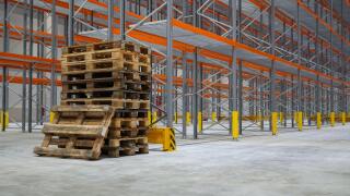Empty stack pallets in logistics warehouse