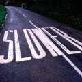 Slower Road Sign