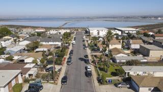 Aerial view of Imperial beach residential area and San Diego Bay on the background, San Diego, California, USA, North America