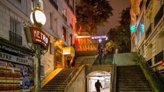 entrance metro montmartre paris france night