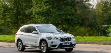 Milton Keynes,UK - Oct 16th 2023: 2016 white BMW X1  driving on an English road.