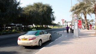 Dubai Taxi at a bustop in Burdubai, UAE