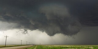 Severe thunderstorm lowering cloud threatens tornado