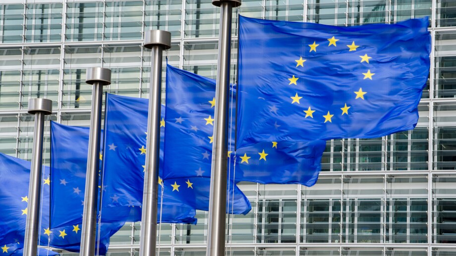 EU flags in front of European Commission in Brussels
