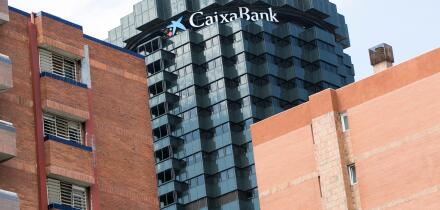 A logo sign outside of the headquarters of the La Caixa group and Caixa Bank in Barcelona, Spain on August 24, 2017.