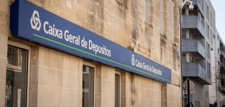 Picture of a sign with the logo of Caixa Geral de Depositos taken on their agency in the city center of Bordeaux, France. Caixa Geral de Depositos (CG