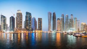 Skyline of skyscrapers  at night in  Marina district of Dubai United Arab Emirates