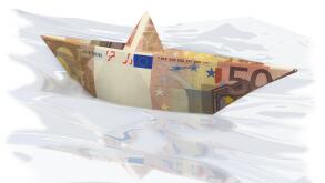 paper boat with 50 euro