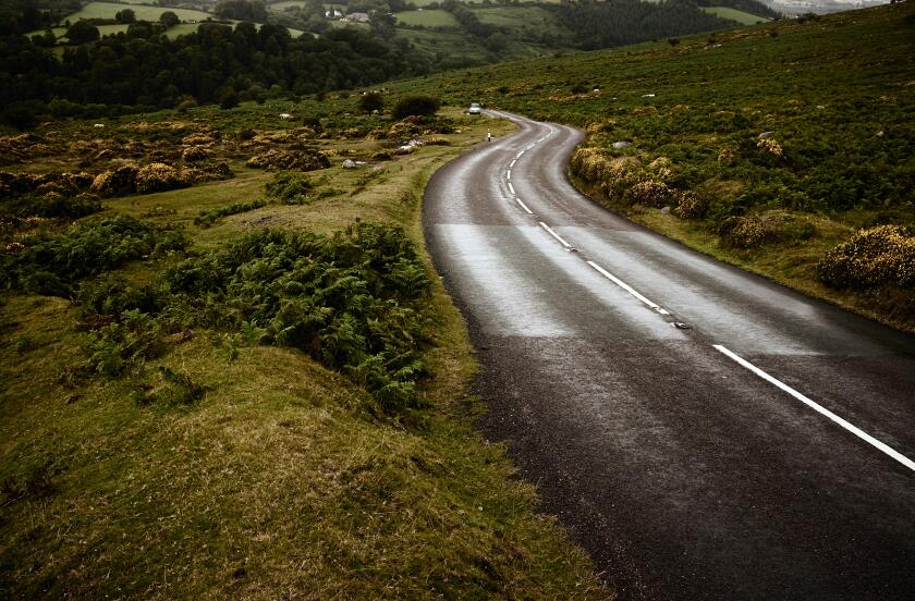 Empty country road through moorland.
