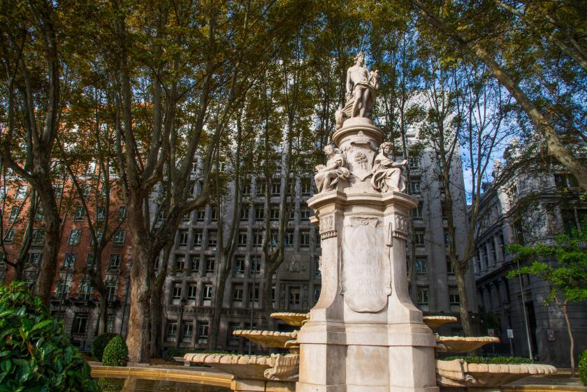 Apolo fountain and ICO building. Paseo del Ptrado, Madrid, Spain.