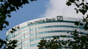 A logo sign outside of an office building occupied by Deutsche Bank in Amsterdam, Netherlands on October 4, 2015.