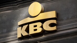 Gold KBC Bank logo on facade in Brussels, Belgium