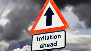 Inflation rising ahead - UK financial sign concept