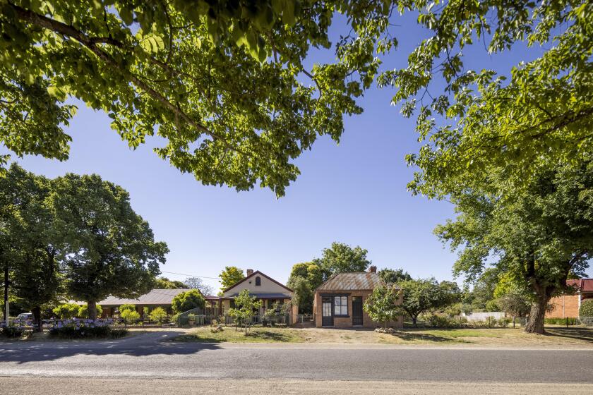 The suburban street with houses and trees in Beechworth, Victoria, Australia