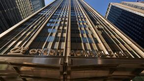 view of the massive midtown buildings in Manhattan from street level - Avenue of Americas' skyscrapers