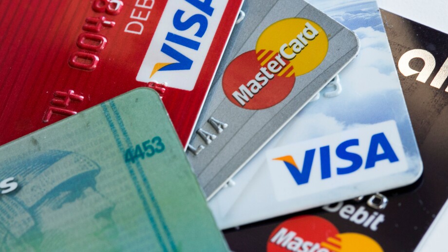 Arranged photos of various U.S. credit cards from Visa, MasterCard and American Express