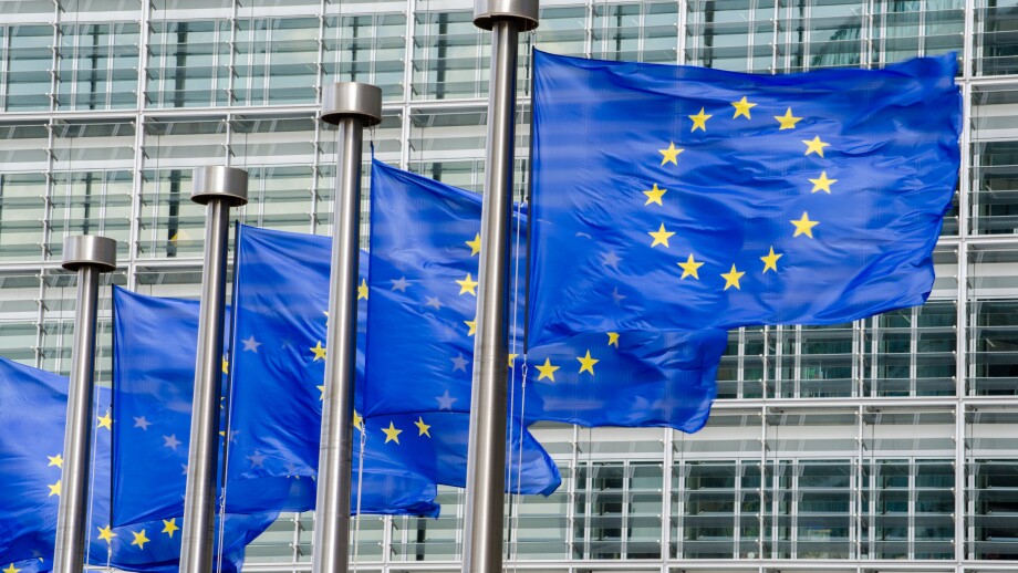 EU flags in front of European Commission in Brussels