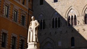 The statue of Sallustio Bandini outside the headquarters of Monte dei Paschi di Siena bank in Siena, Italy.