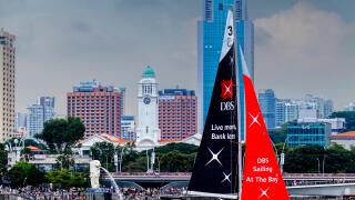 Sailing At The Bay, A DBS Sailboat Sails In Front Of The Merlion Park Area, Singapore, South East Asia