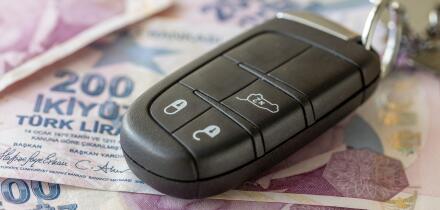 Car keys and Turkish lira. Business concept. Car insurance, Parking zone, transportation regulations, Leasing, Car loan, transportation costs, toll ro