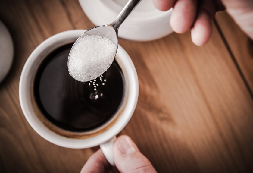 Adding Sugar to Coffee-sweeten-adobe-2022