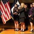 Kathi Vidal being ceremonially sworn in by commerce secretary Gina Raimondo