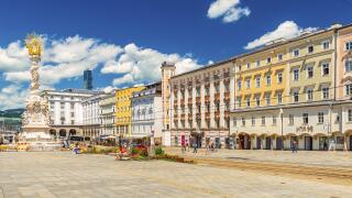 Linz - June 2020, Austria: View of the main square of Linz with colorful buildings in the traditional architectural style