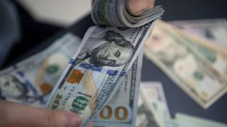 HAIAN, CHINA - JUNE 16, 2022 - A staff member counts US dollar notes at a bank in Haian City, East China's Jiangsu Province, June 16, 2022. The US Fed