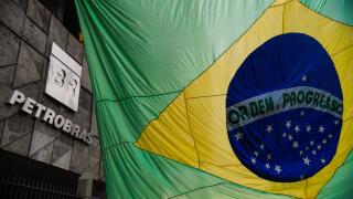 Brazilian flag at Petrobras oil company building headquarters. Brazil's national state-owned corporation in the petroleum industry