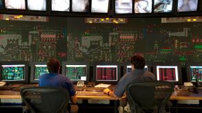 Italy, Brescia, SA2A Waste-to-energy plant uses gases created by the combustion of waste to produce electric and thermal energy, technicians at the co