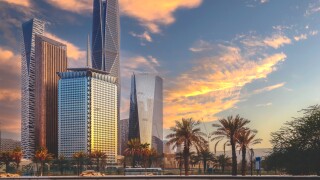 Sunset over large buildings equipped with the latest technology,