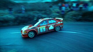 Tommi Makinen driving his Mitsubishi Lancer Evo VI on a stage of the 1999 Monte Carlo Rally