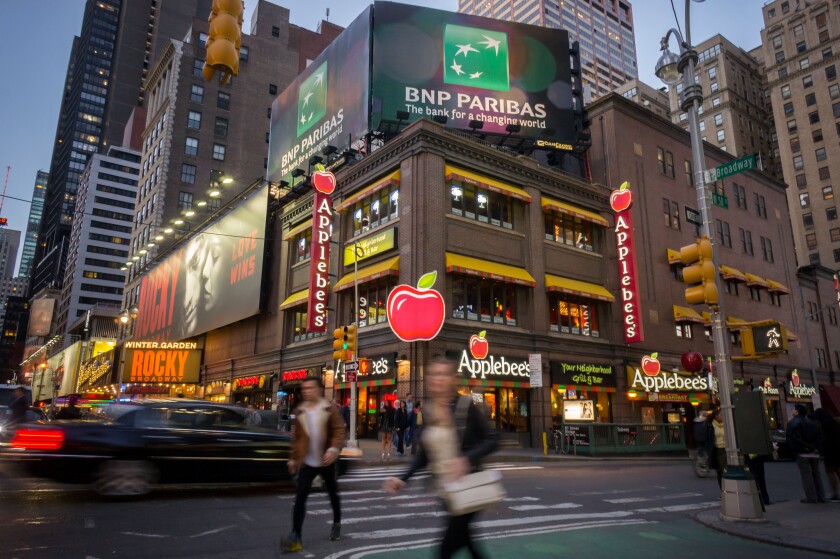 Advertising for the French bank, BNP Paribas, is seen in New York