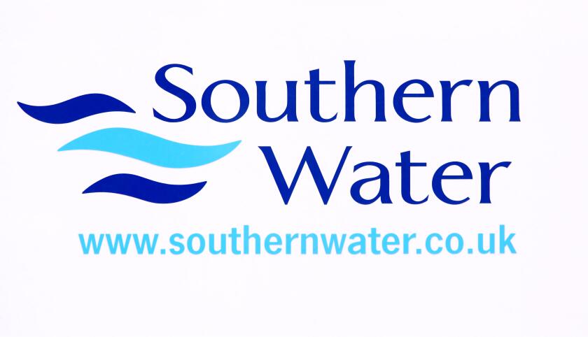 Southern Water logo and signage photographed on the back of a Southern Water white van.