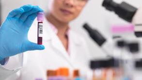 Scientist preparing clinical samples for medical testing in a laboratory