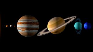 Sun and the eight planets of the solar system on black background. Realistic 3d illustration of the rendering of the planets size. Copy space