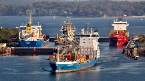 Shipping container ships at Holtenau lock, Kiel Canal, Kiel, Schleswig-Holstein, Germany, Europe