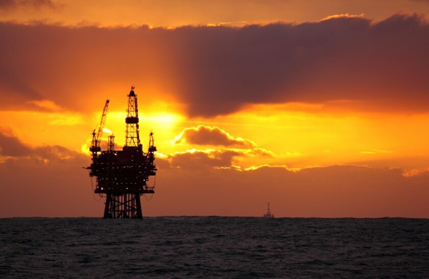 Sunrise at the Eider platform, 60 miles northeast of Shetland, North Sea, November 2013. All non-editorial uses must be cleared individually.