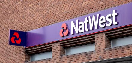 NatWest bank sign and logo on outside wall