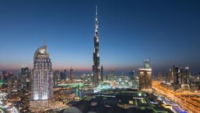 Burj Khalifa , the Dubai Mall and skyline of Downtown Dubai at night in United Arab Emirates