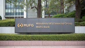 MUFG - Mitsubishi UFJ Financial Group Company sign in front of the Head office in Chiyoda City.