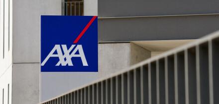 St. Gallen, Switzerland - 14th April 2021 : AXA insurance company sign hanging in front of a office in St. Gallen. AXA is a French multinational insur