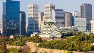 Osaka Castle from above skyline with skyscraper city in Japan