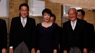 Tokyo, Japan. 10th Aug, 2022. Japan's Prime Minister Fumio Kishida (L), Minister in Charge of Economic Security Sanae Takaichi (C), Finance Minister Shunichi Suzuki and other ministers prepare for a photo session at Kishida's residence in Tokyo, Japan, Au