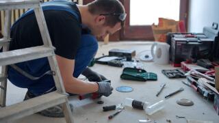 Handyman preparing tools for home improvement