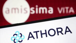 In this photo illustration an Athora Holding Ltd. logo is seen on a smartphone screen with an Amissima Vita logo in the background. (Photo by Pavlo Gonchar / SOPA Images/Sipa USA)