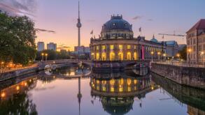 The river Spree in Berlin at dawn with the famous TV Tower and the museum island