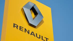 Manno, Ticino, Switzerland - 27th March 2021 : Yellow Renault sign against blue sky in Switzerland. Renault is a French multinational automobile manuf