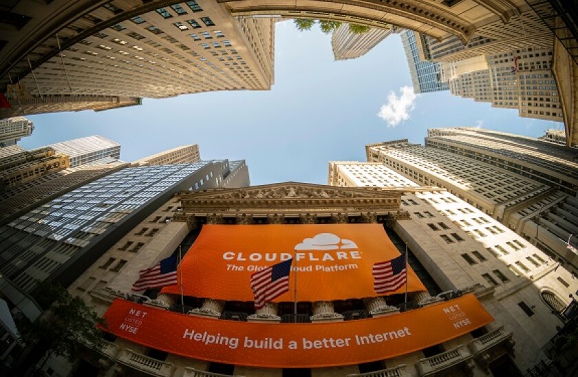 The New York Stock Exchange in Lower Manhattan in New York on Friday, September 13, 2019 is decorated with a banner for the Cloudflare initial public offering. Cloudflare provides security and support for content distribution for commercial websites. (© R